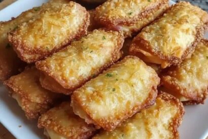 Thumbnail for Crab Rangoon Egg Rolls Recipe